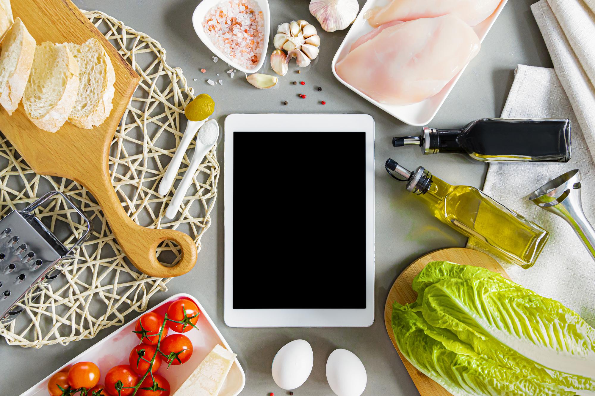 Flat lay of culinary subscription materials
